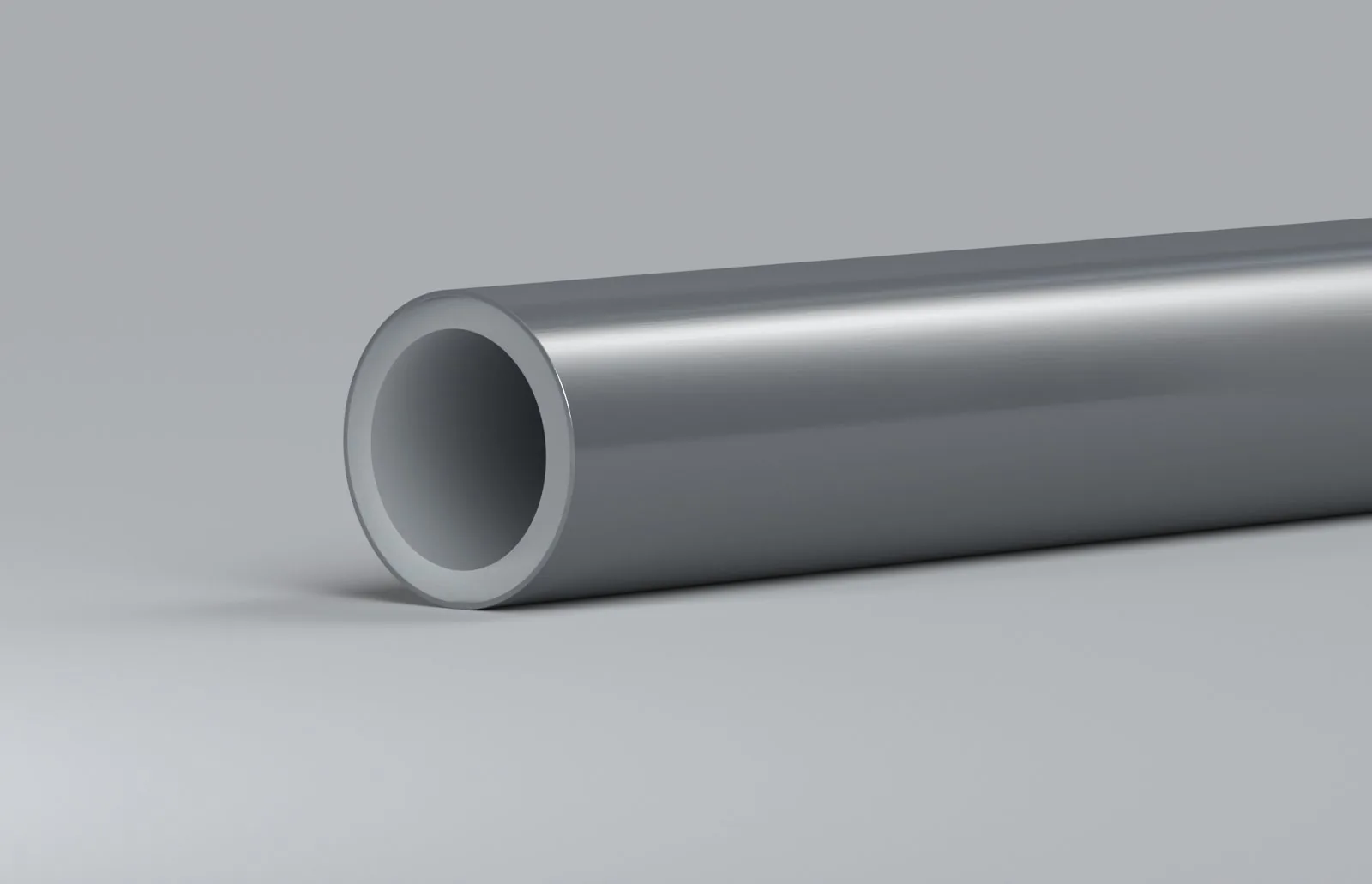 Cut cross-section of PEX heating pipe showing the solid crosslinked wall and smooth bore