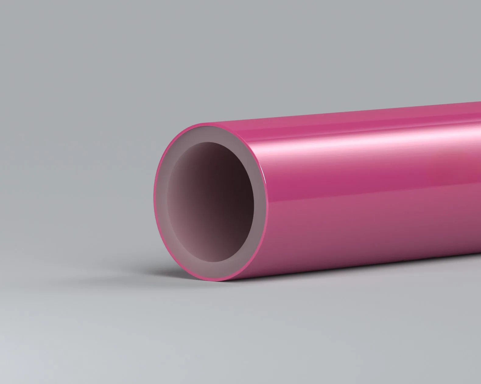 End-on view of PEX pipe showing the oxygen-barrier layer laminated inside the wall, relevant to chlorine oxidation from the bore